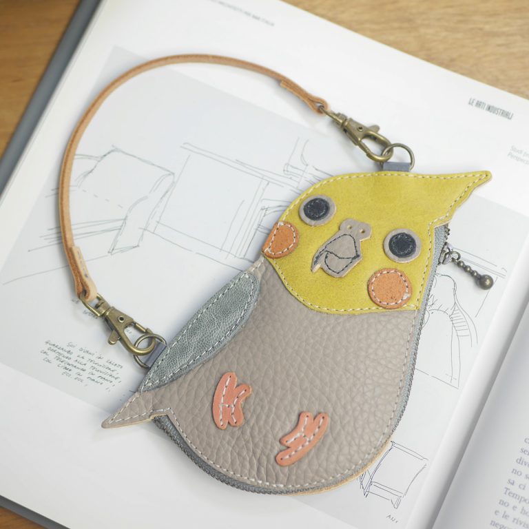 Leather multi-pouch with a cockatoo
